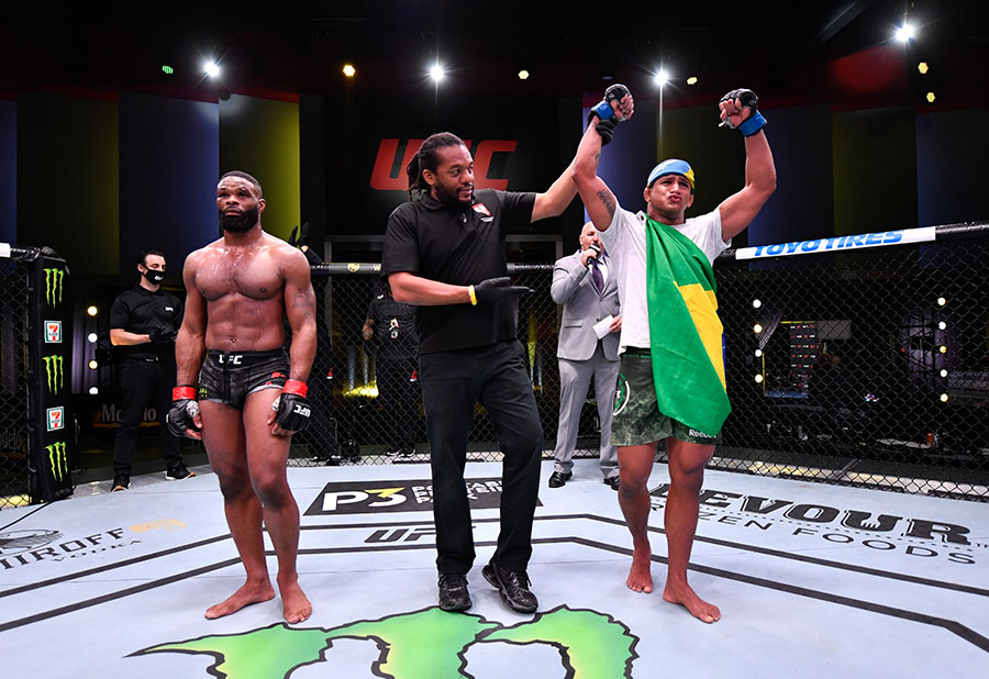LAS VEGAS, NEVADA - MAY 30: Gilbert Burns of Brazil reacts after his victory over Tyron Woodley in their welterweight fight during the UFC Fight Night event at UFC APEX on May 30, 2020 in Las Vegas, Nevada. (Photo by Jeff Bottari/Zuffa LLC)